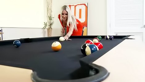 Blonde loves playing billiards so much
