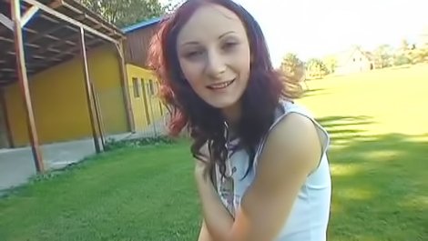 Ginger babe is being fucked outdoors