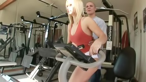 Slutty blonde is getting fucked in gym