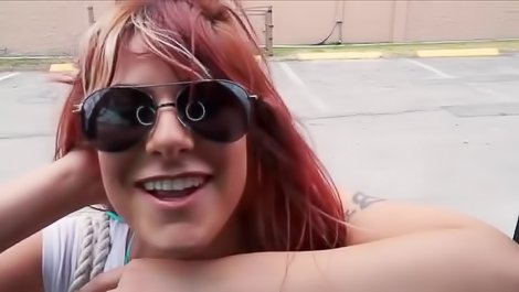 Hot redhead girl fucking in the car