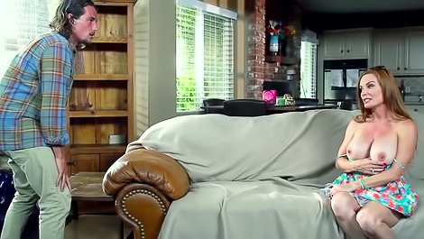 Busty MILF is being fucked wildly