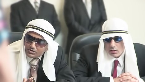 Two men are punishing the lady