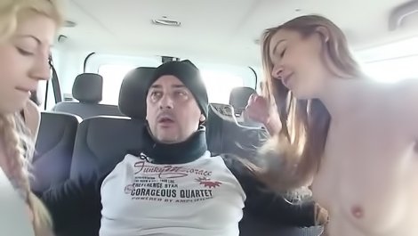 Man is fucking two sluts in car